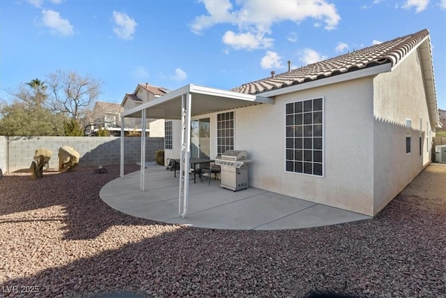 back of property featuring a patio area and cooling unit