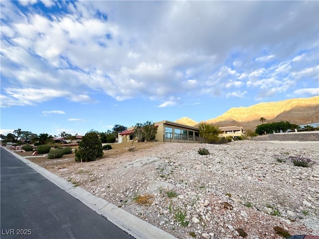 exterior space featuring a mountain view