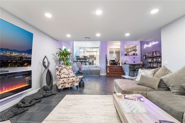 living room featuring indoor bar