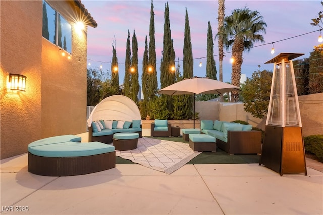 patio terrace at dusk with an outdoor hangout area