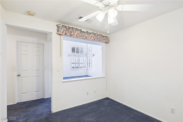 carpeted empty room with ceiling fan