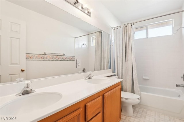 full bathroom featuring toilet, shower / bath combo, and vanity