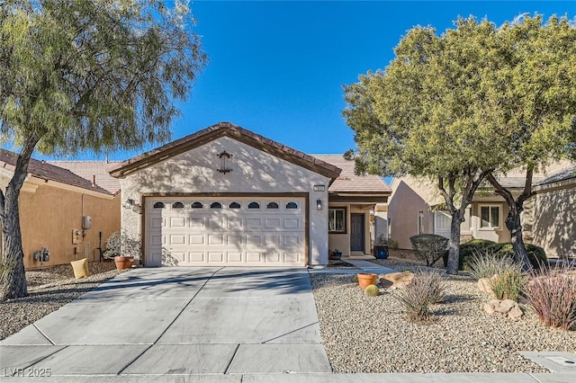 ranch-style house featuring a garage