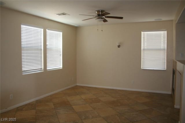 spare room featuring ceiling fan