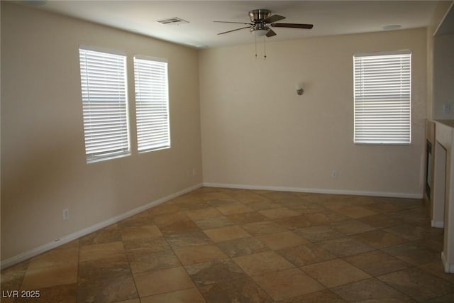 unfurnished room featuring ceiling fan