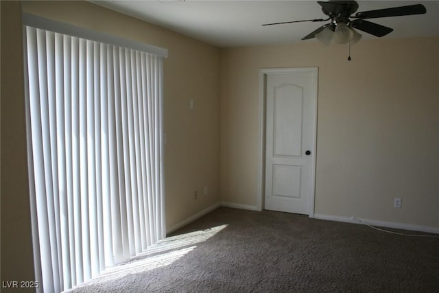 empty room with carpet floors and ceiling fan