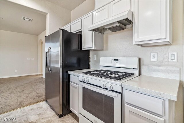 kitchen with stainless steel fridge with ice dispenser, white gas stove, light colored carpet, and white cabinets