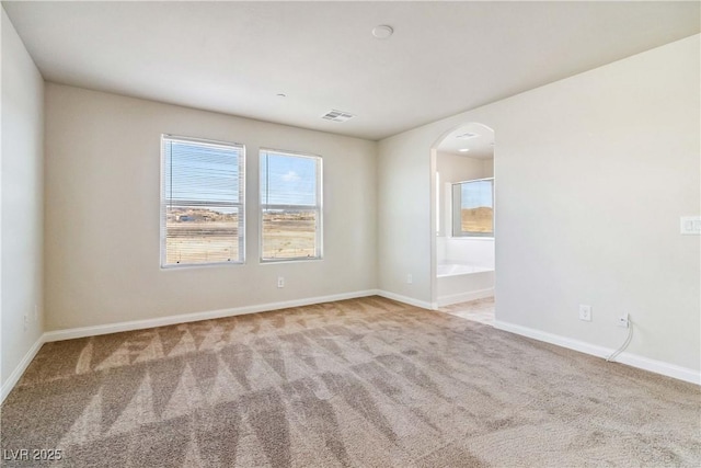 view of carpeted spare room