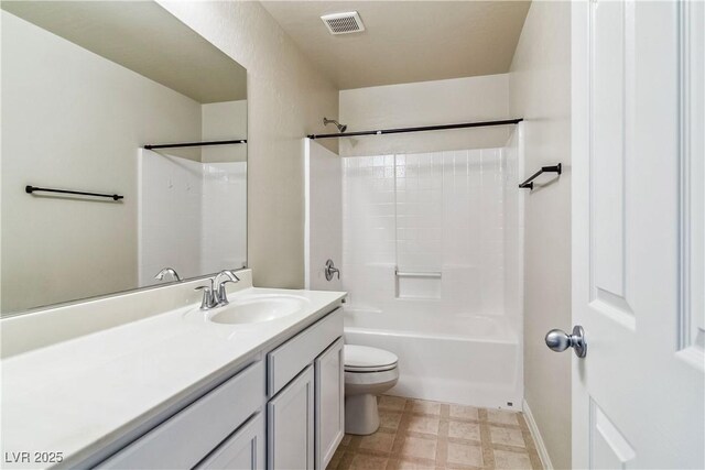 full bathroom with tub / shower combination, toilet, and vanity