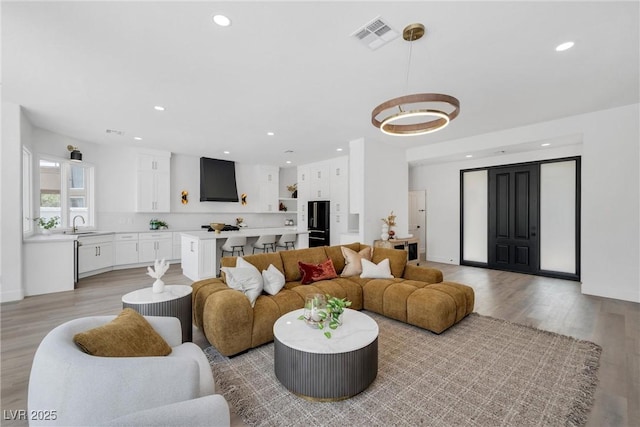 living room featuring light hardwood / wood-style flooring