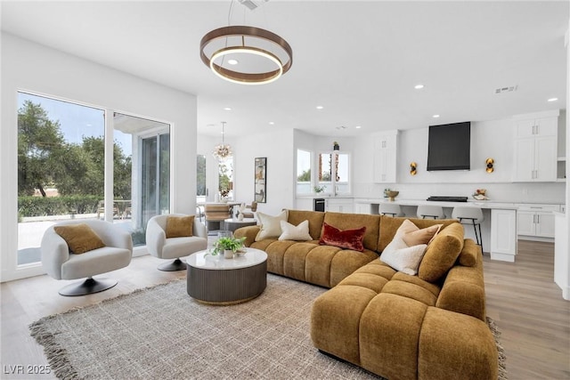 living room featuring light wood-type flooring