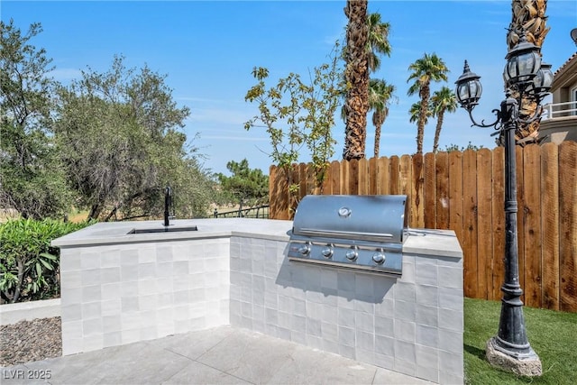 view of patio with grilling area and area for grilling