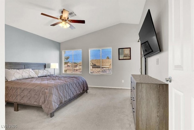 bedroom featuring ceiling fan, light carpet, and lofted ceiling