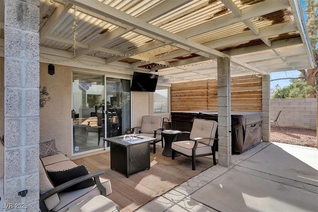 view of patio / terrace with a fire pit