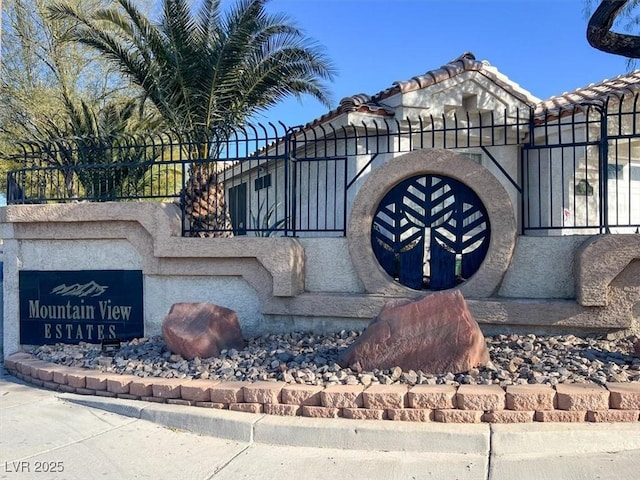 view of community sign