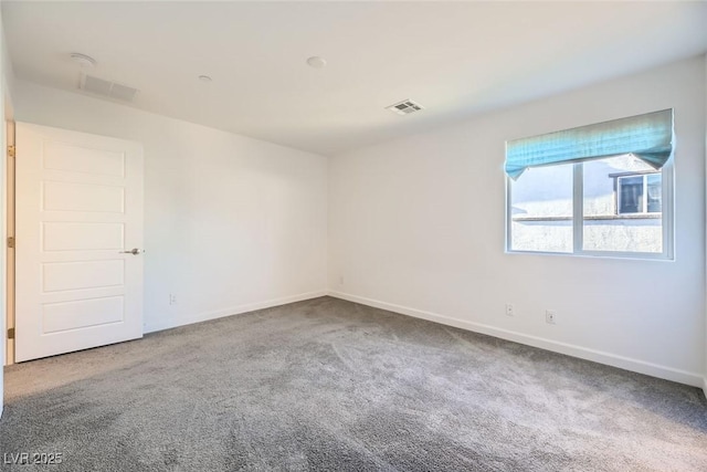 unfurnished room with carpet