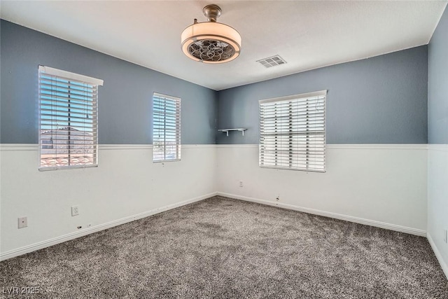 view of carpeted spare room