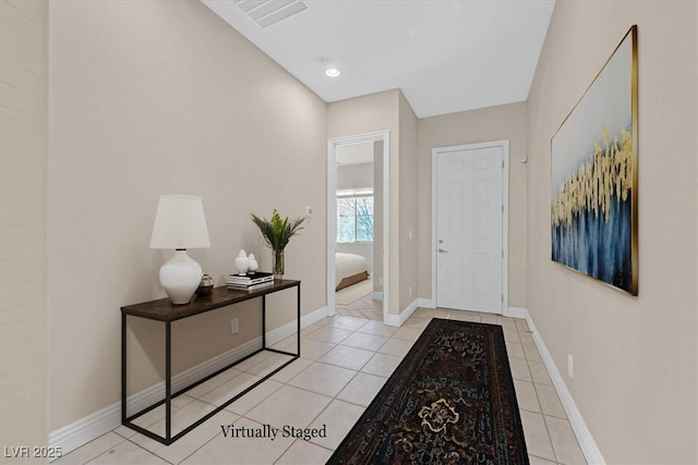 entrance foyer featuring light tile patterned floors