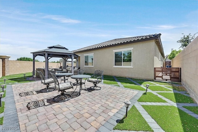 view of patio / terrace with a gazebo