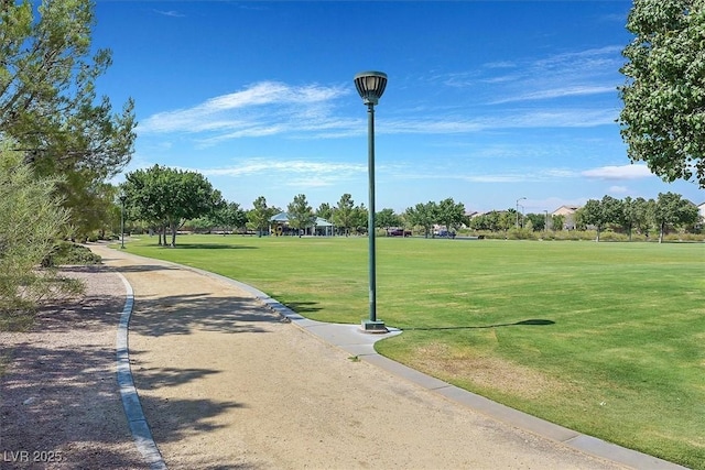 view of home's community featuring a lawn