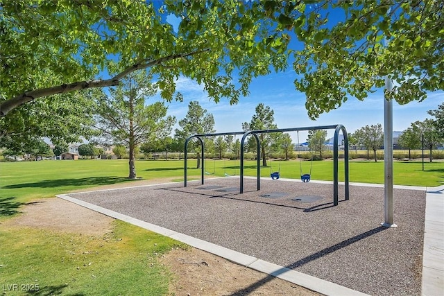 view of jungle gym with a lawn