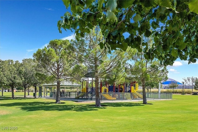 view of community featuring a playground, a gazebo, and a yard