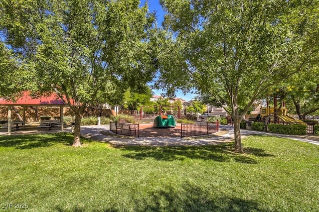 exterior space featuring a playground and a yard