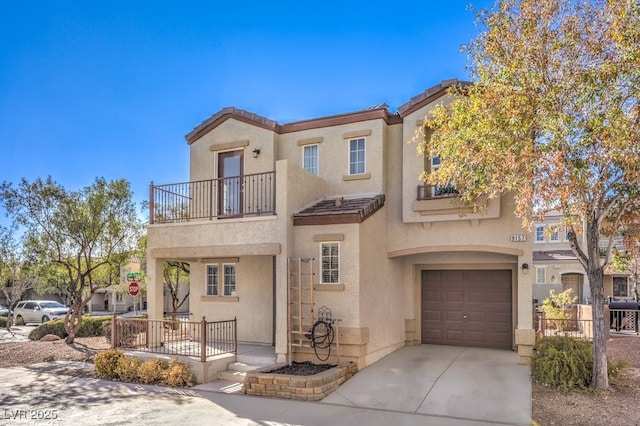 view of front of property with a garage and a balcony