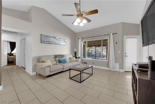 living room with light tile patterned floors, visible vents, baseboards, vaulted ceiling, and a ceiling fan