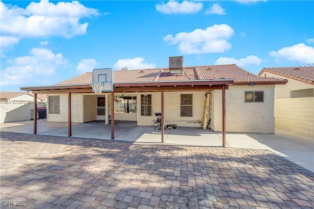 rear view of property with a patio area