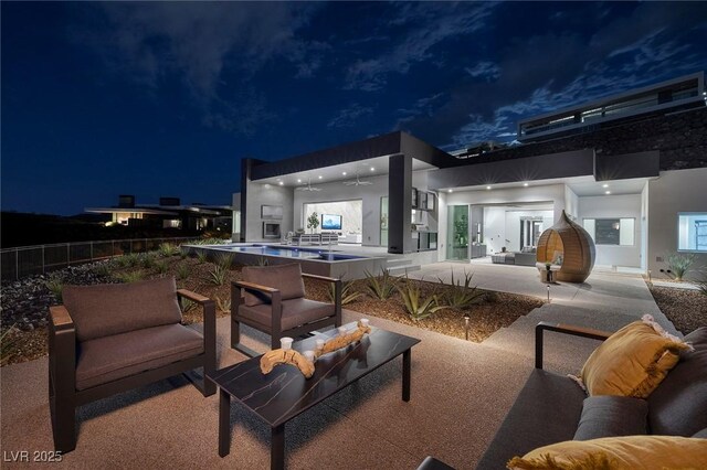 patio at night with an outdoor hangout area