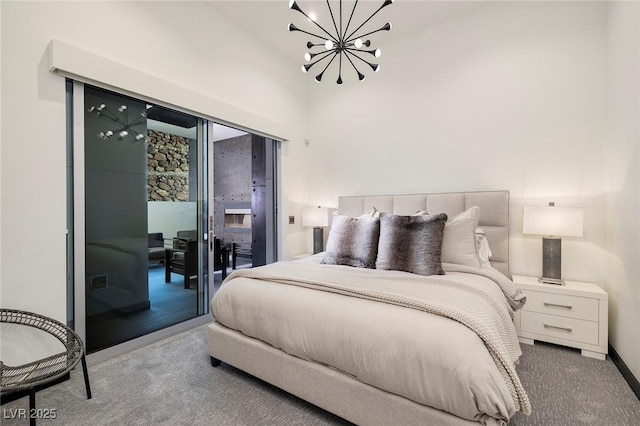 1 Boulderback Dr, Henderson, NV 89012 - bedroom featuring a chandelier, access to outside, carpet, and baseboards