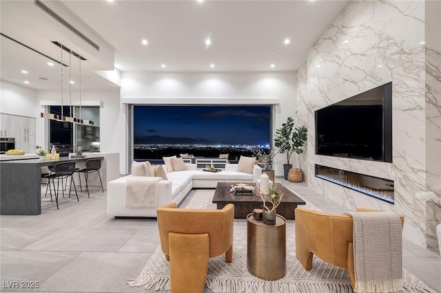 living room featuring a fireplace