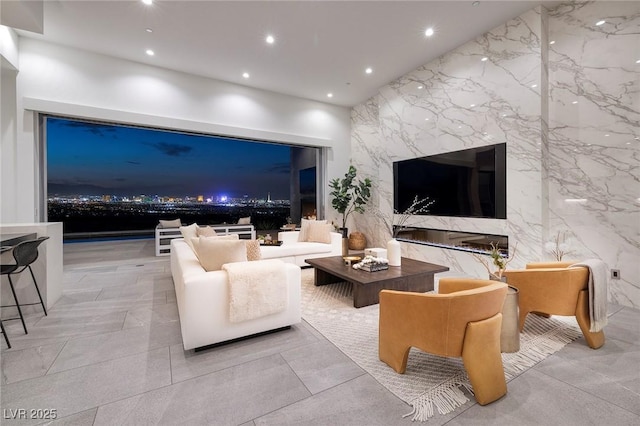1 Boulderback Dr, Henderson, NV 89012 - living room featuring recessed lighting and stone wall