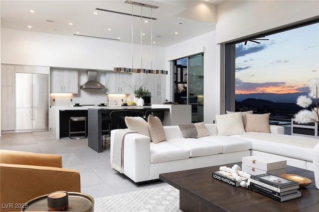 living room featuring a high ceiling