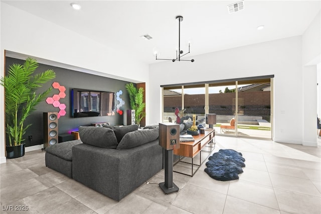 living room with a notable chandelier