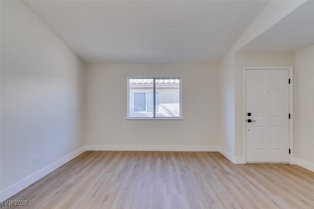 unfurnished room featuring light hardwood / wood-style flooring