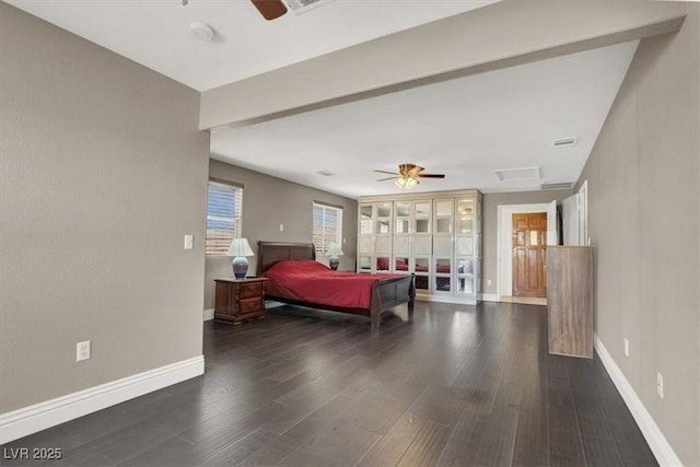 bedroom featuring dark hardwood / wood-style flooring