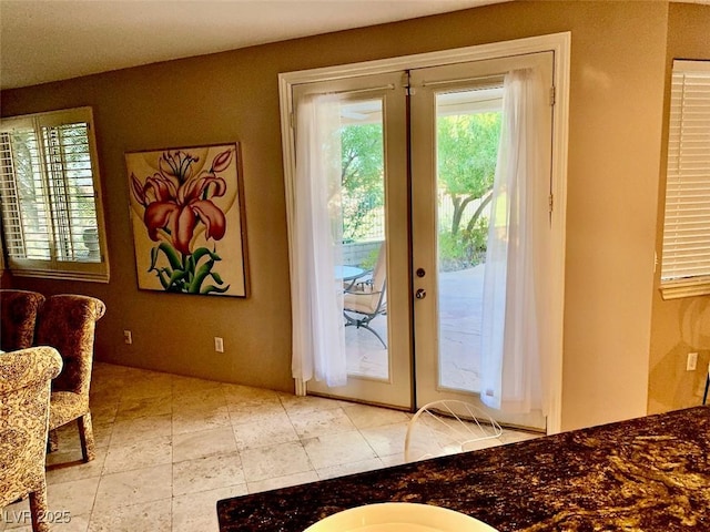 entryway featuring french doors