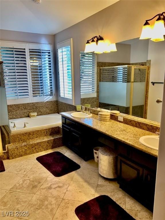 bathroom with vanity, tile patterned flooring, and independent shower and bath