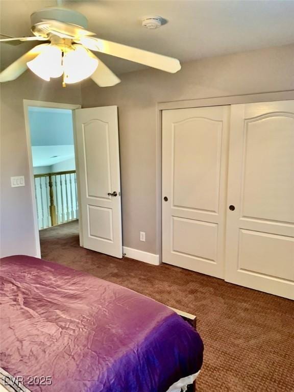 bedroom with ceiling fan, a closet, and carpet floors