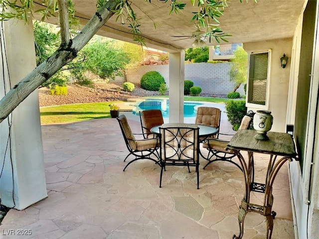 view of patio / terrace featuring a fenced in pool