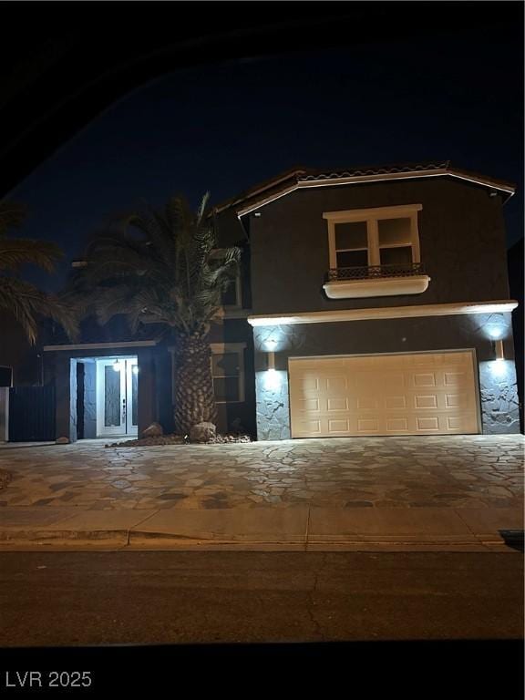 view of front of property featuring a garage