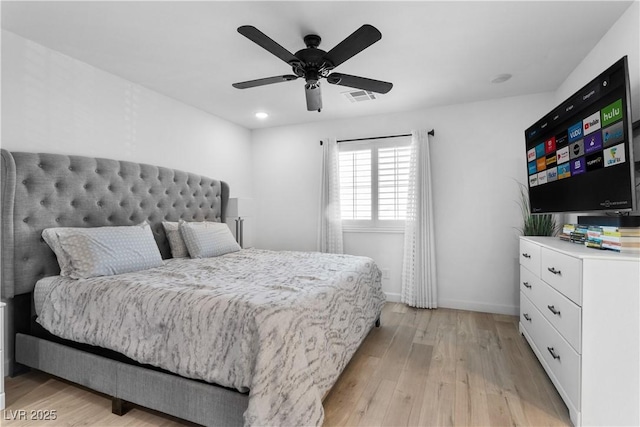 bedroom featuring ceiling fan and light hardwood / wood-style floors