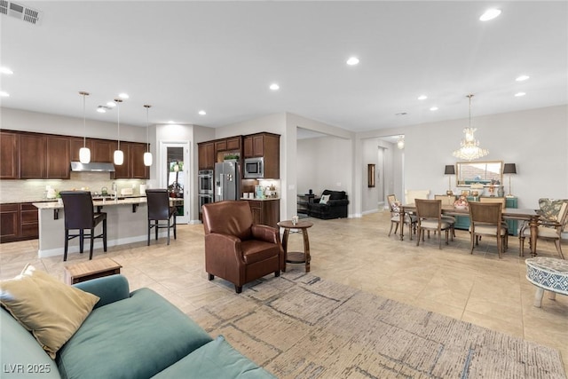 living room with light tile patterned floors