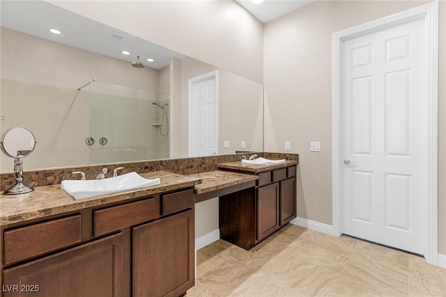 bathroom featuring vanity and walk in shower