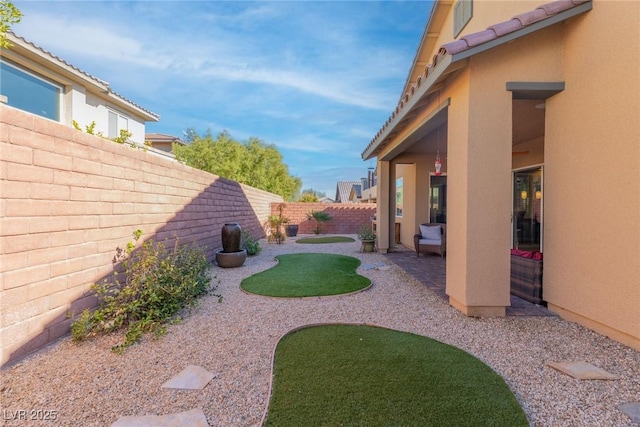 view of yard featuring a patio