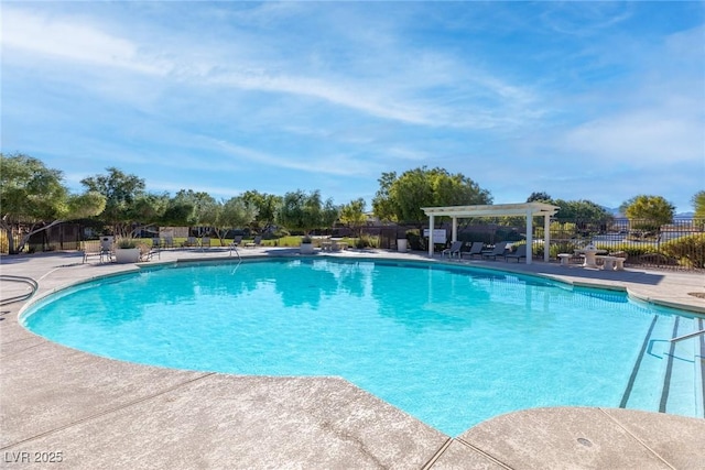 view of swimming pool with a pergola and a patio area