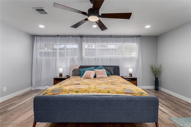 bedroom featuring ceiling fan and wood-type flooring