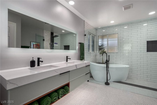 bathroom featuring vanity, tile patterned floors, and independent shower and bath